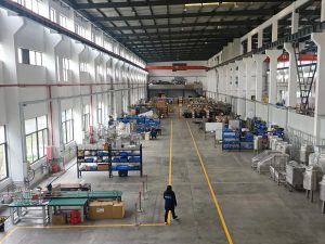 A quiet, high-tech assembly line inside a Chinese factory, illustrating the total China sourcing Chinese New Year impact on manufacturing output.