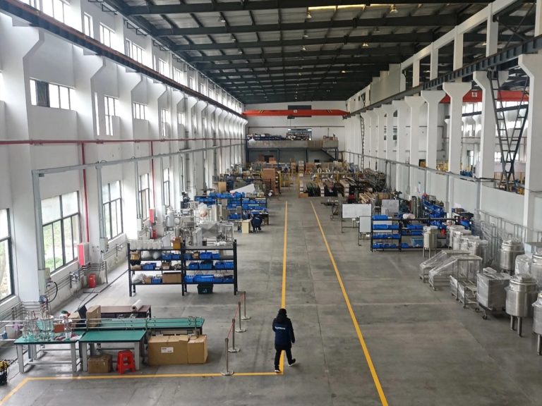 A quiet, high-tech assembly line inside a Chinese factory, illustrating the total China sourcing Chinese New Year impact on manufacturing output.