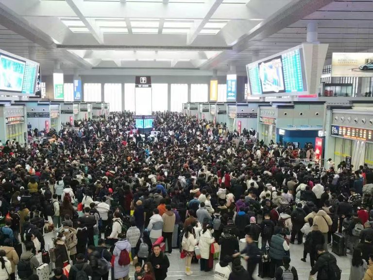 Massive crowds at a Chinese railway station during the Spring Festival migration, the primary driver of the China sourcing Chinese New Year impact.